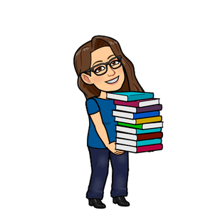 Ms. Hazen with a stack of books.